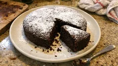 Torta al Cioccolato: A Simple Italian Chocolate Cake with a Powdered Sugar Finish