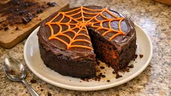 Moist Chocolate Pumpkin Cake with Mascarpone Frosting (Easy Spiderweb Top)